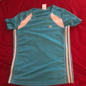 adidas climaLite workout shirt fits like a Large.